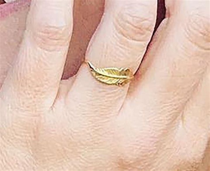 
Sara Bareilles Shows Off Her Unique Gold Feather Band Engagement Ring from Fiancé Joe Tippett 